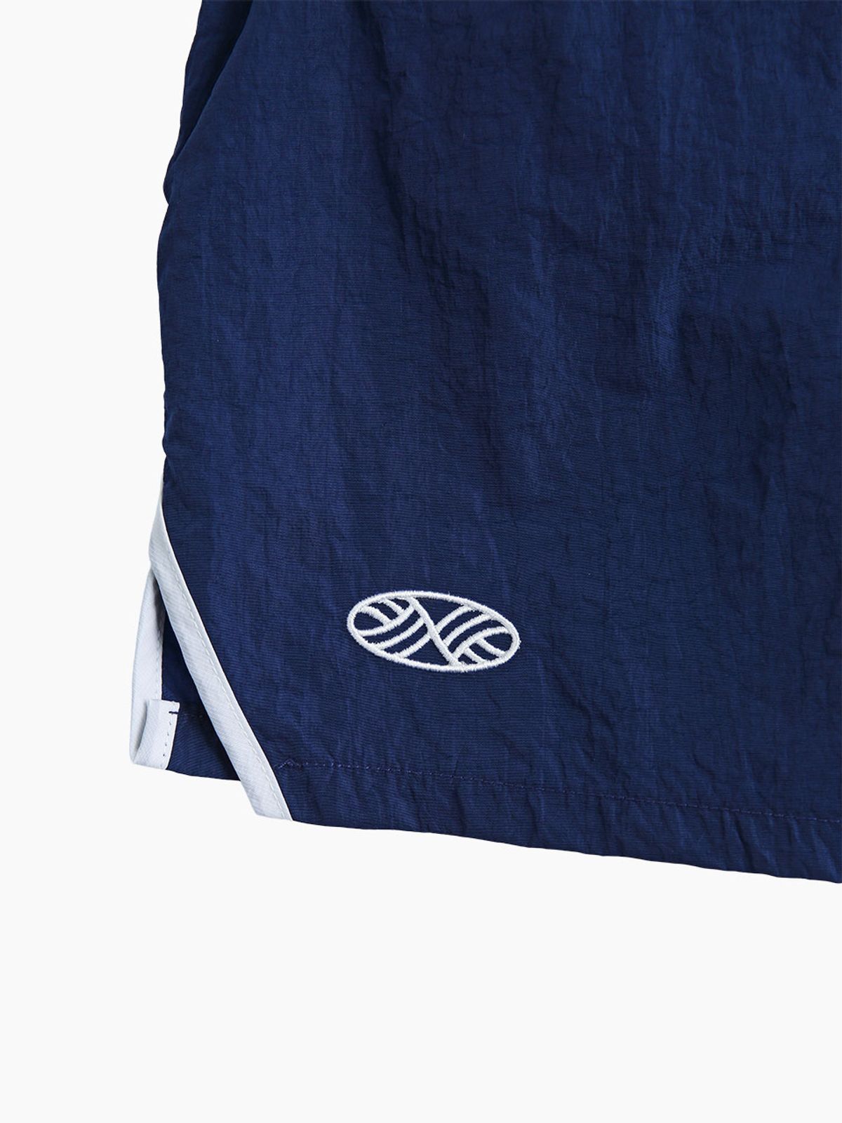 미나수(MENASOO) RUNNING TRACK NYLON SHORTS_NAVY