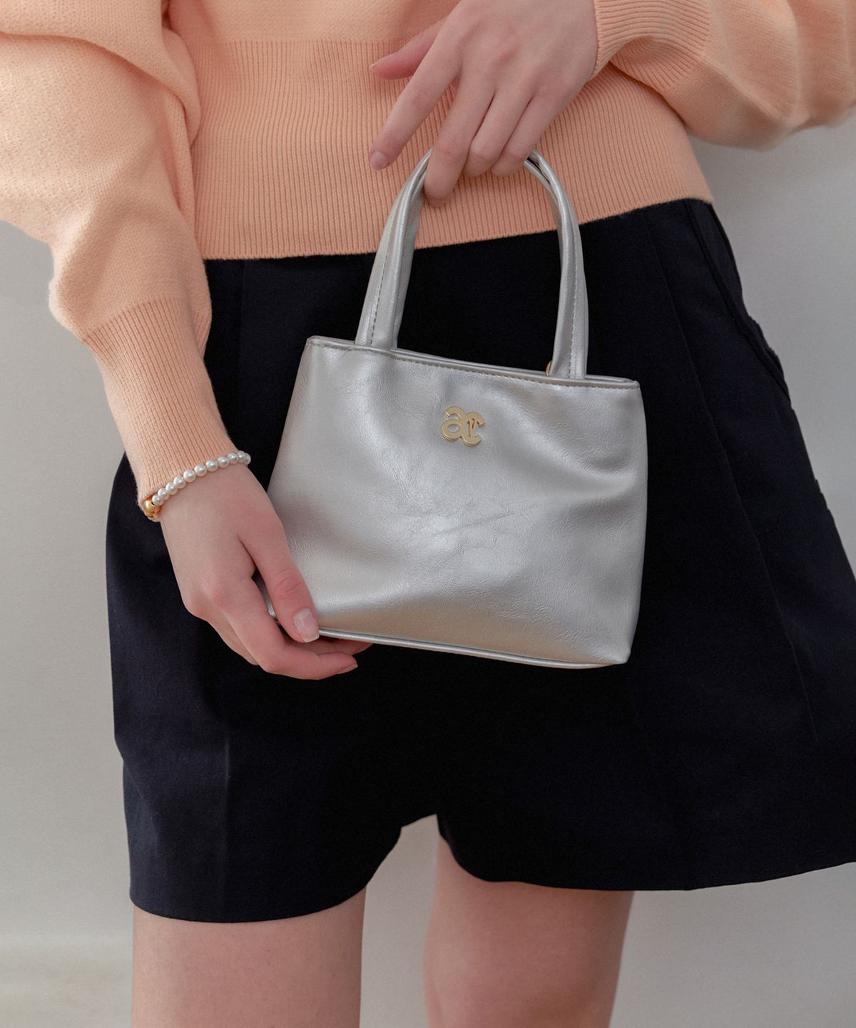 아노에틱(ANOETIC) ANC LOGO TINY TOTE BAG_SILVER