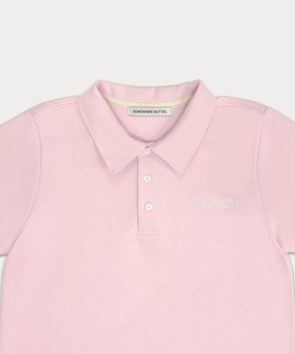 썸웨어버터(SOMEWHEREBUTTER) Classy logo pique top - pink