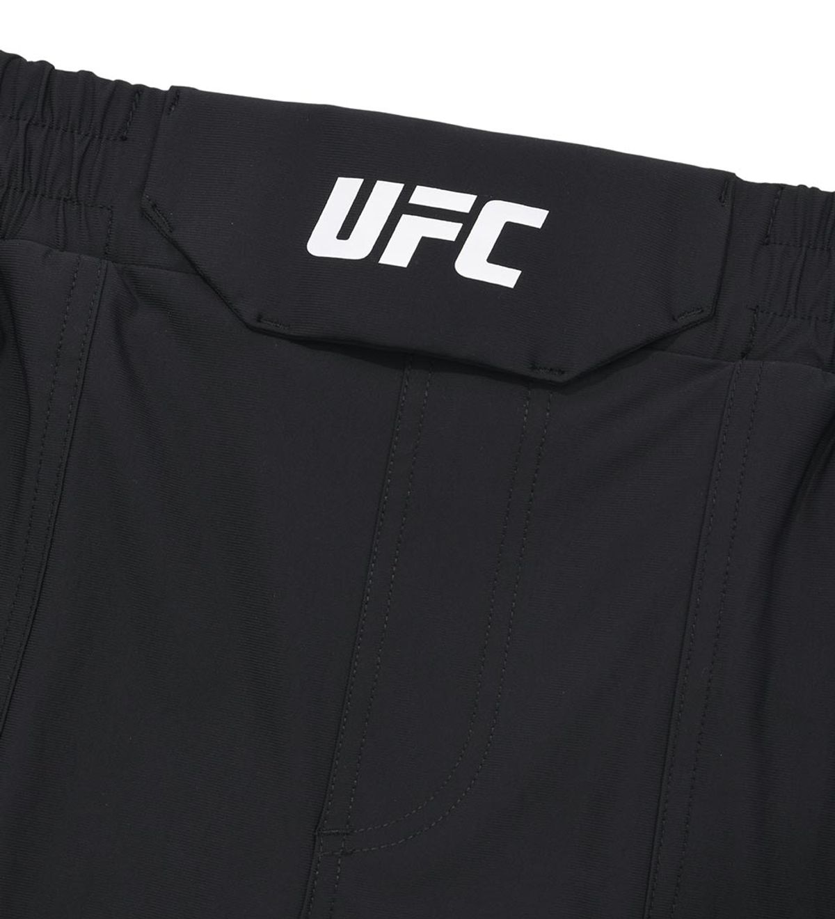 유에프씨 스포츠(UFC SPORT) UFC 트리코트 레귤러핏 쇼츠 7인치 블랙 U4SPV2110BK
