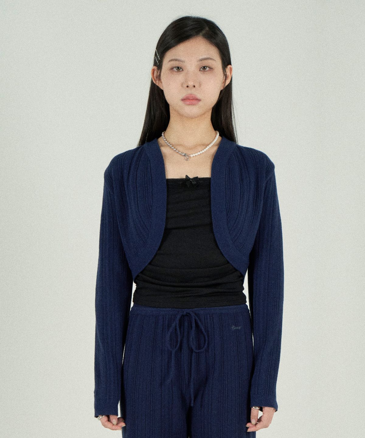 토바스(TOVAS) 불규칙 골지 볼레로 가디건 (네이비)
