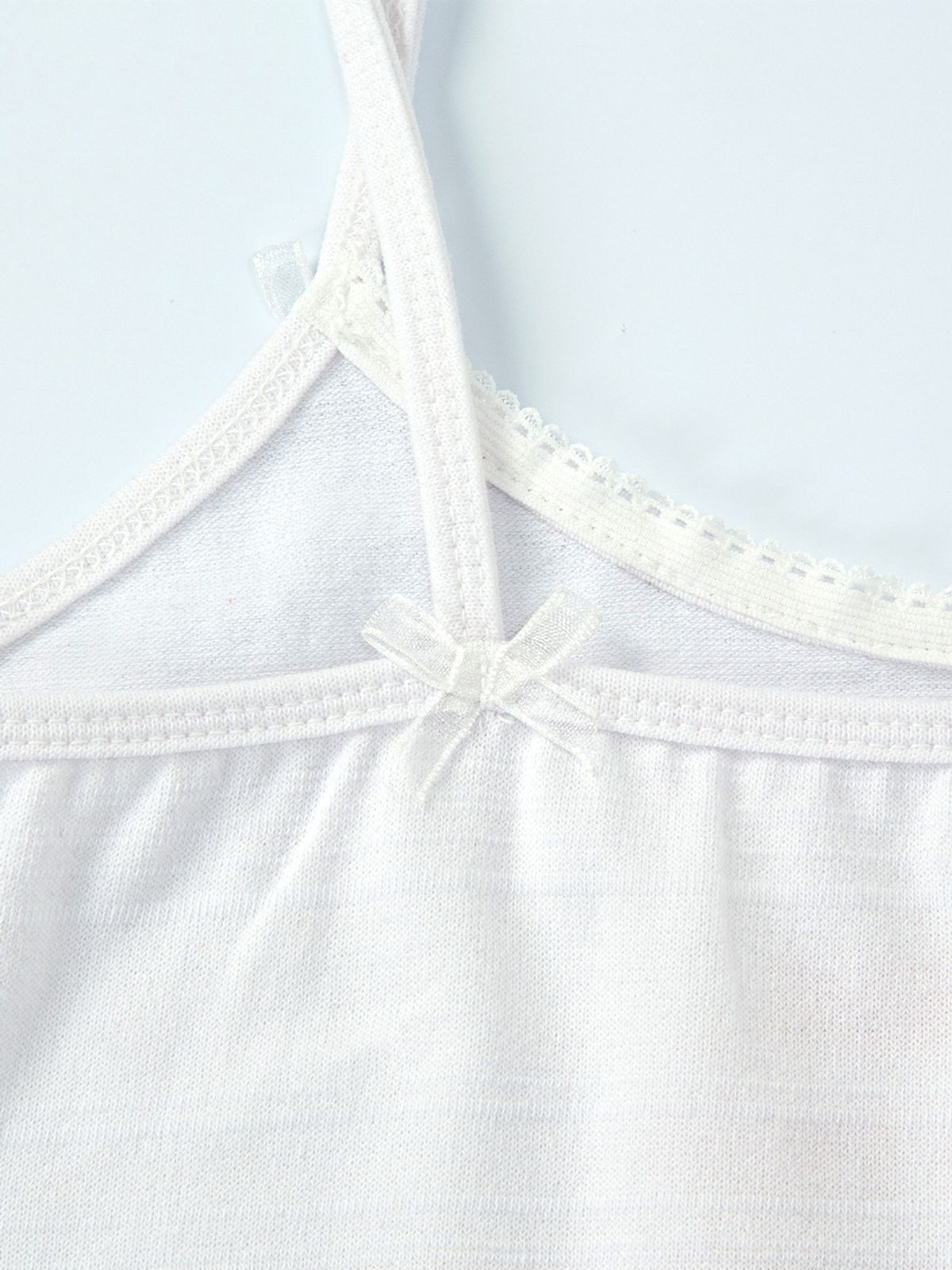 에즈이프 캘리(ASIF CALIE) SUN-KISSED SLEEVELESS WHITE