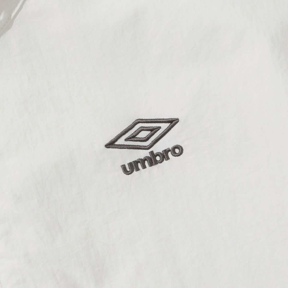 엄브로(UMBRO) 클래식 우먼스 후드형 바람막이 집업 자켓 아이보리(UQ222CJK43)