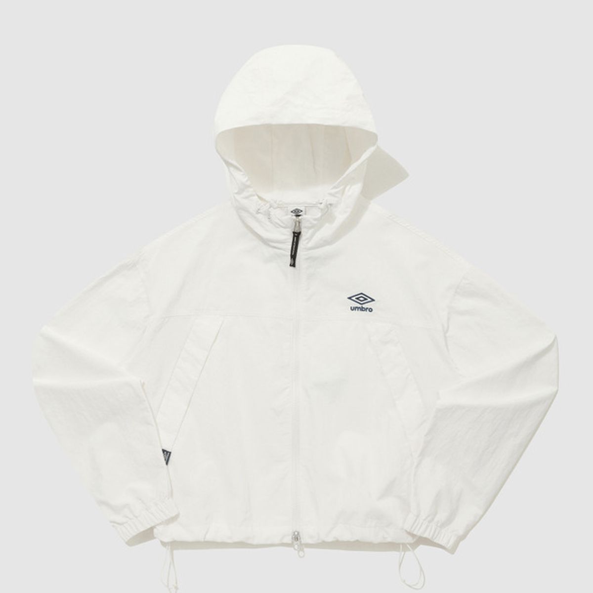 엄브로(UMBRO) 클래식 우먼스 후드형 바람막이 집업 자켓 아이보리(UQ222CJK43)