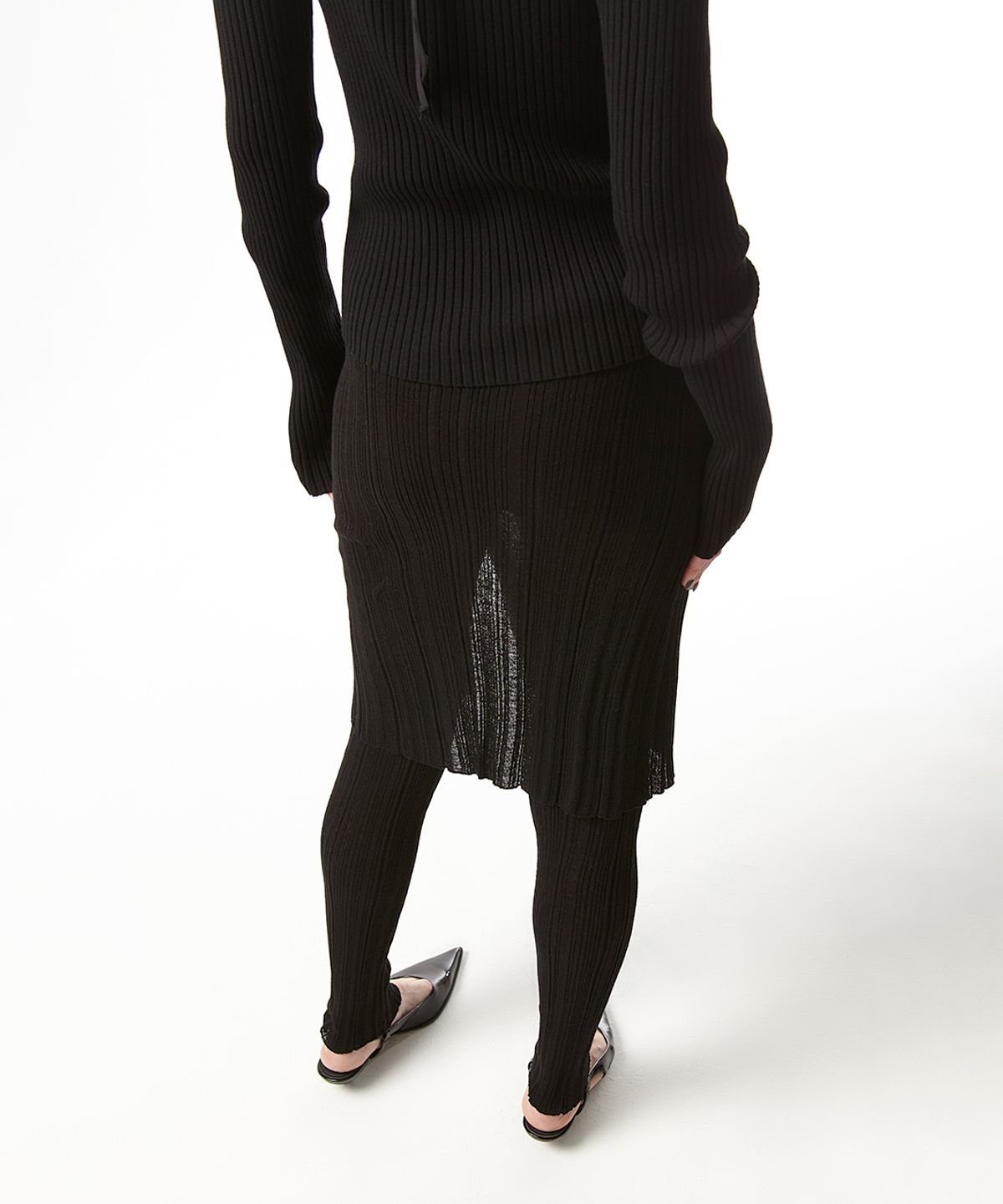 이안조(EAN JO) RIBBED LAYER KNIT LEGGINGS SKIRT(BLACK)