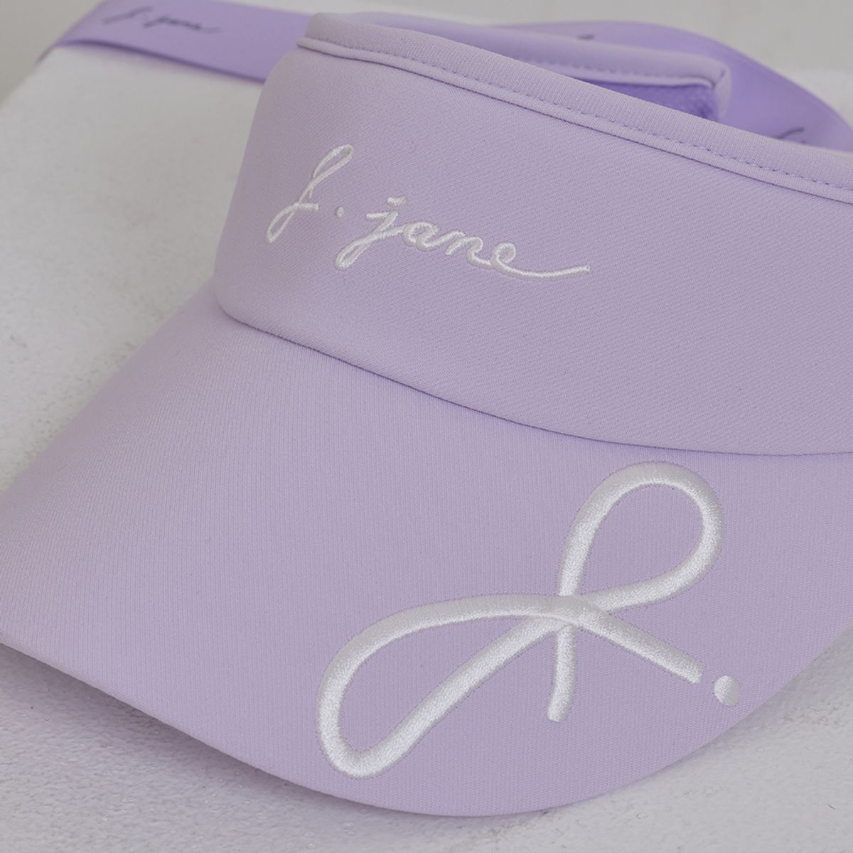제이제인(J.JANE) 로고 리본 썬캡 (Lavender)
