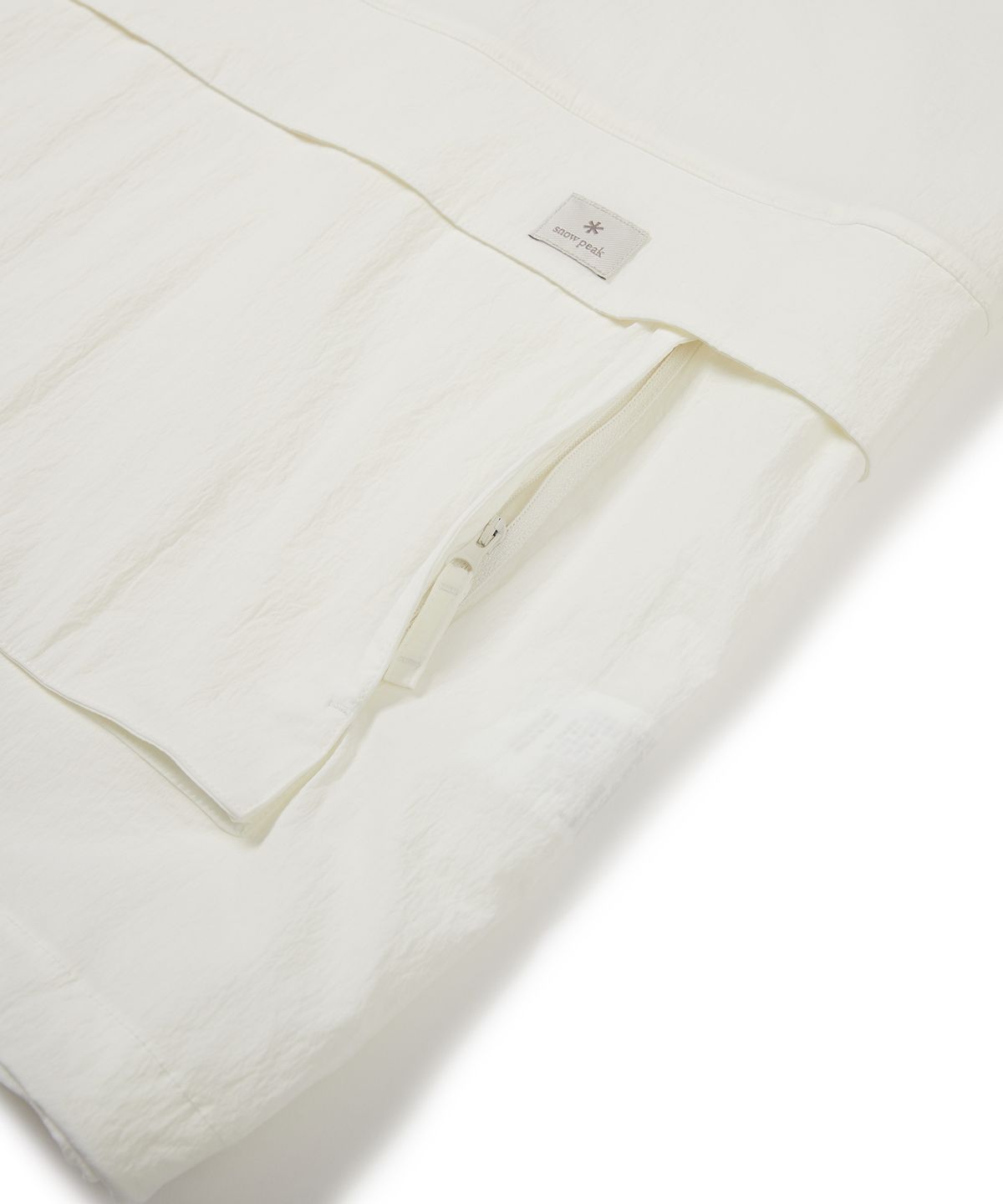 스노우피크 어패럴(SNOWPEAK APPAREL) 루트 후드 반팔 아노락 Ivory (S24MURAN65)