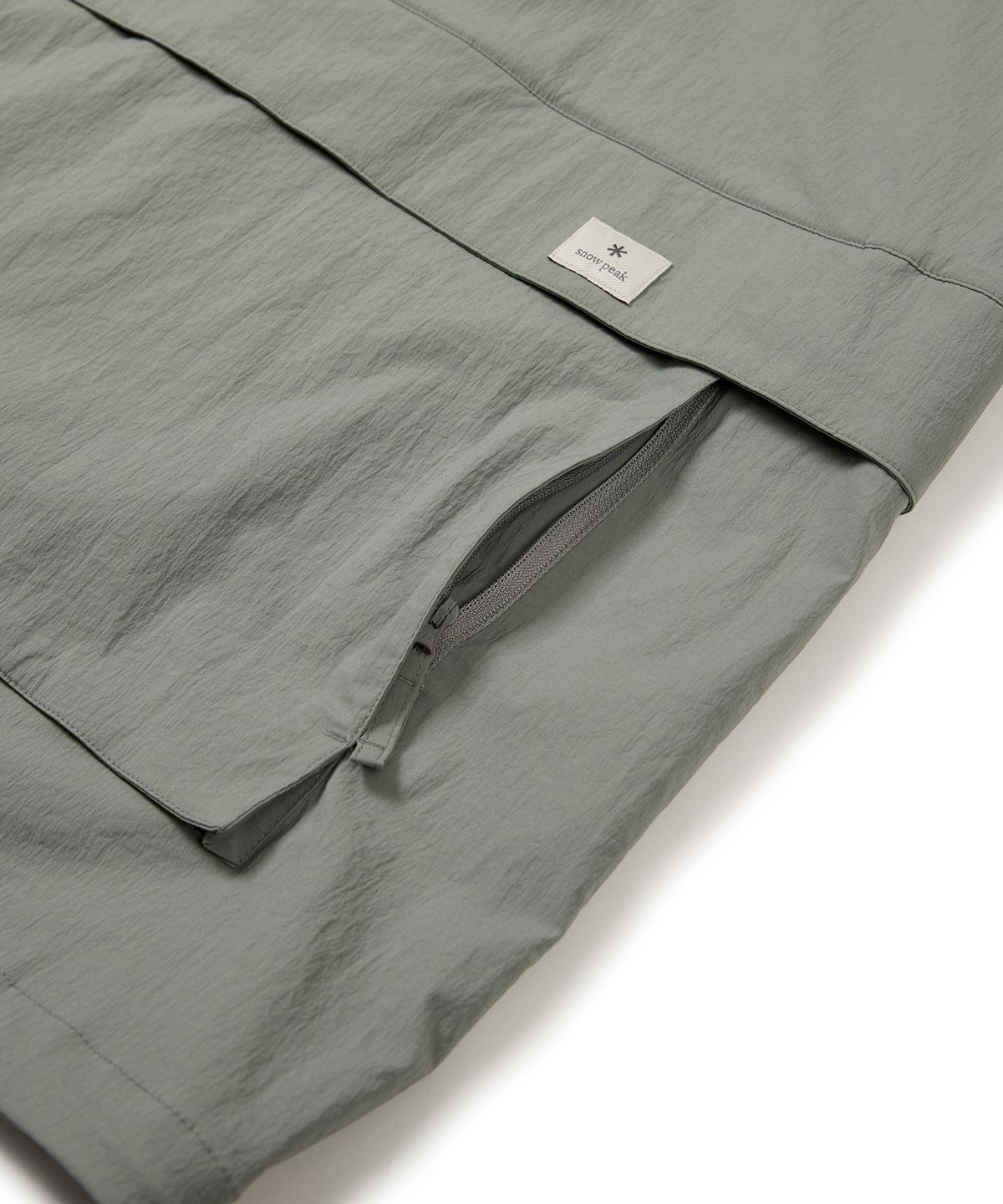 스노우피크 어패럴(SNOWPEAK APPAREL) 루트 후드 반팔 아노락 Light Khaki (S24MURAN65)