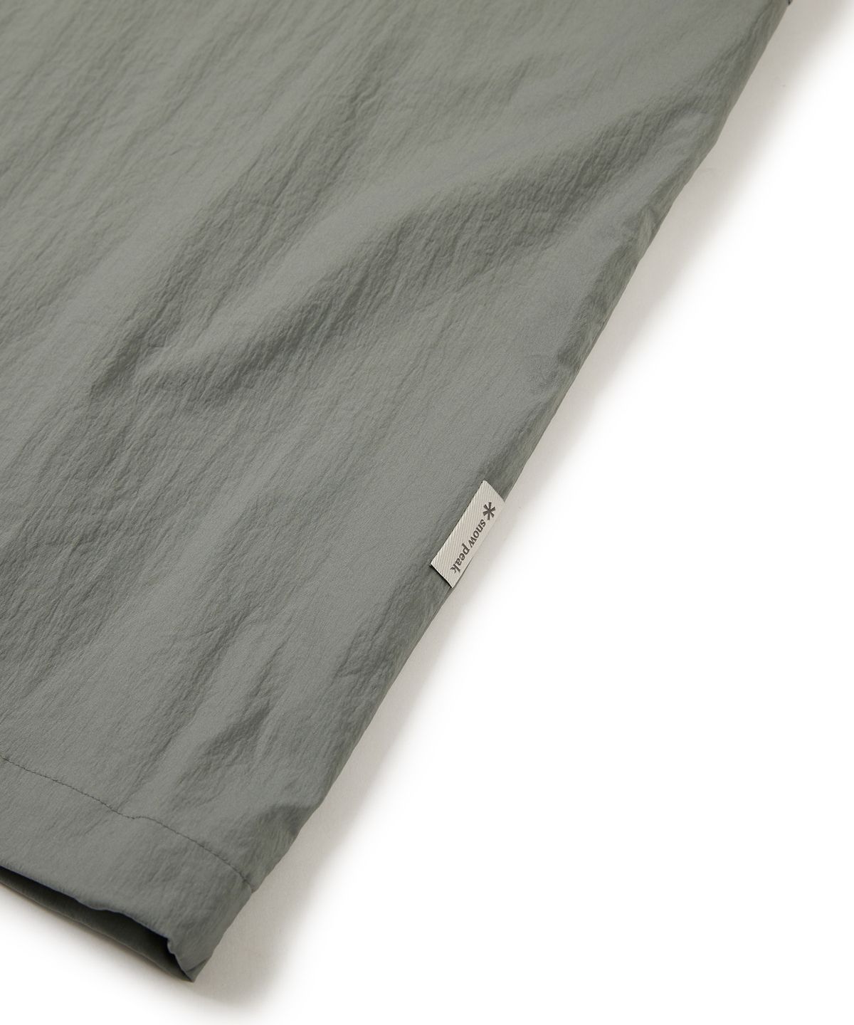 스노우피크 어패럴(SNOWPEAK APPAREL) 루트 후드 반팔 아노락 Light Khaki (S24MURAN65)