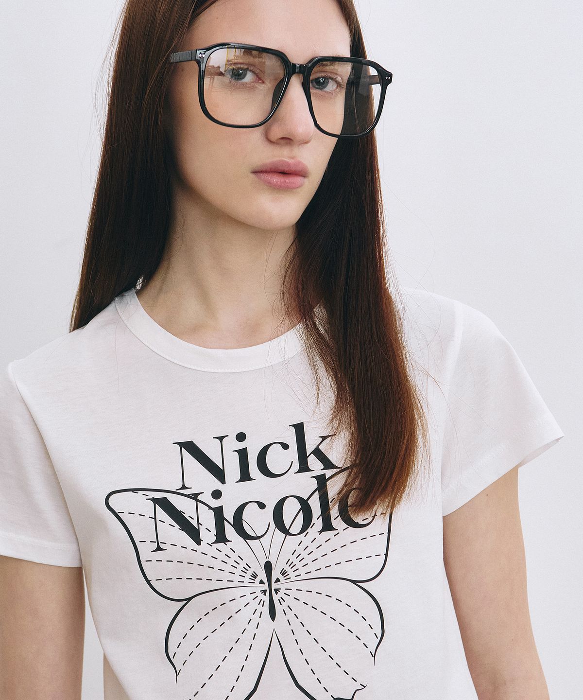 닉앤니콜(NICK&NICOLE) BUTTERFLY SIGNATURE CROP TOP_IVORY BLACK