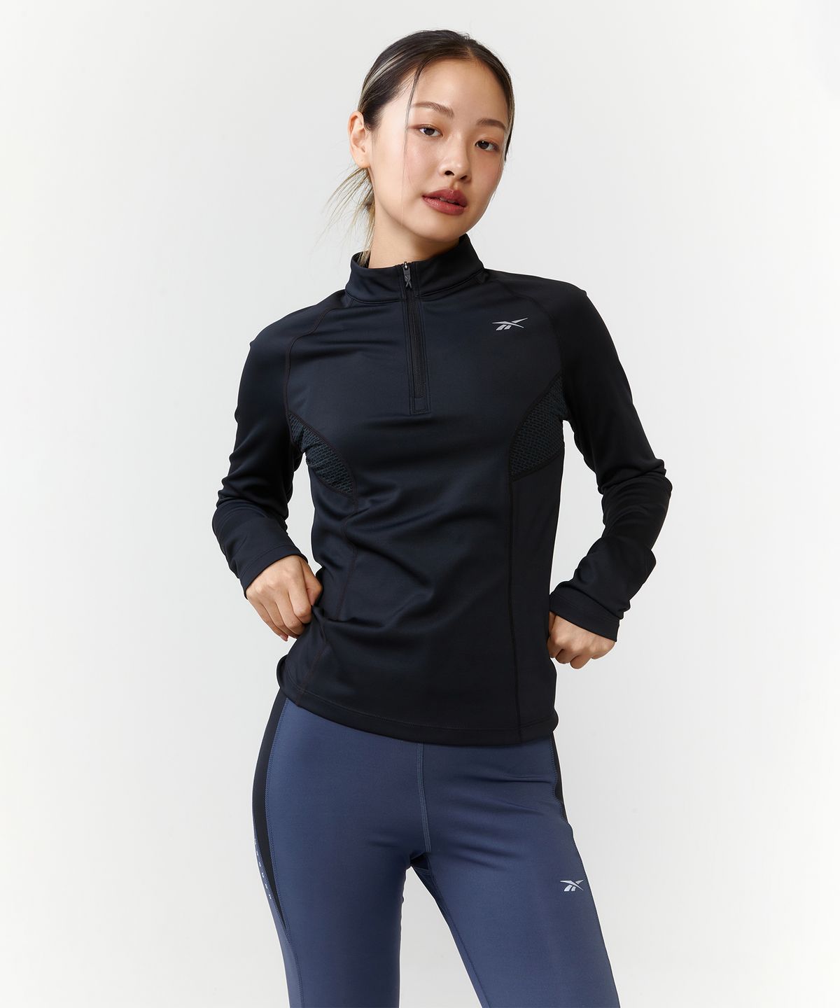 리복(REEBOK) 러닝 하프 집업 티셔츠 (W) - 블랙 / 100075413