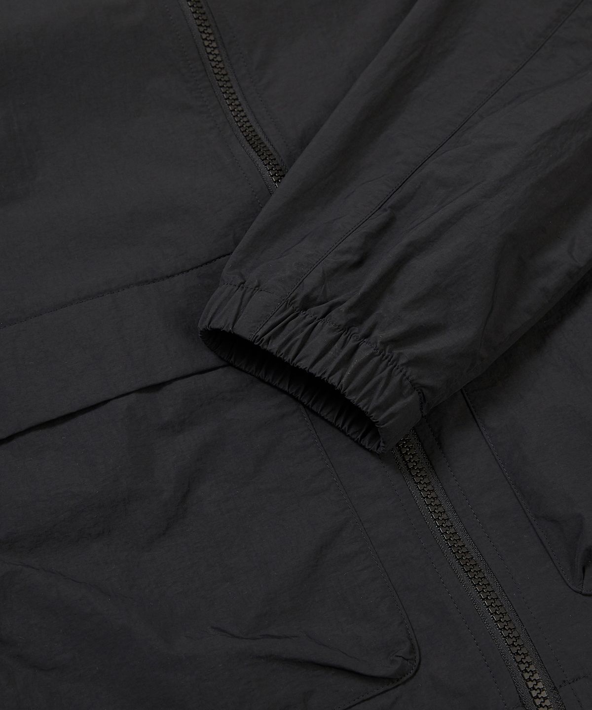 스노우피크 어패럴(SNOWPEAK APPAREL) 타슬란 여성 우븐 스탠드넥 바람막이 Black (S24MWLWB51)