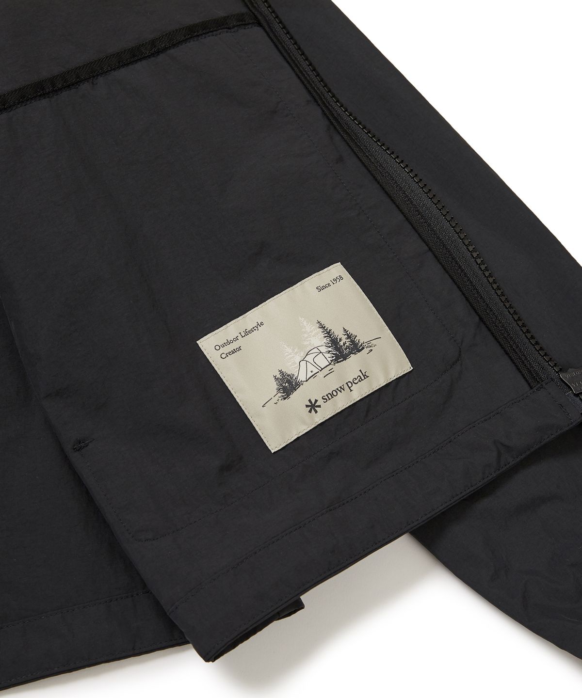 스노우피크 어패럴(SNOWPEAK APPAREL) 타슬란 여성 우븐 스탠드넥 바람막이 Black (S24MWLWB51)