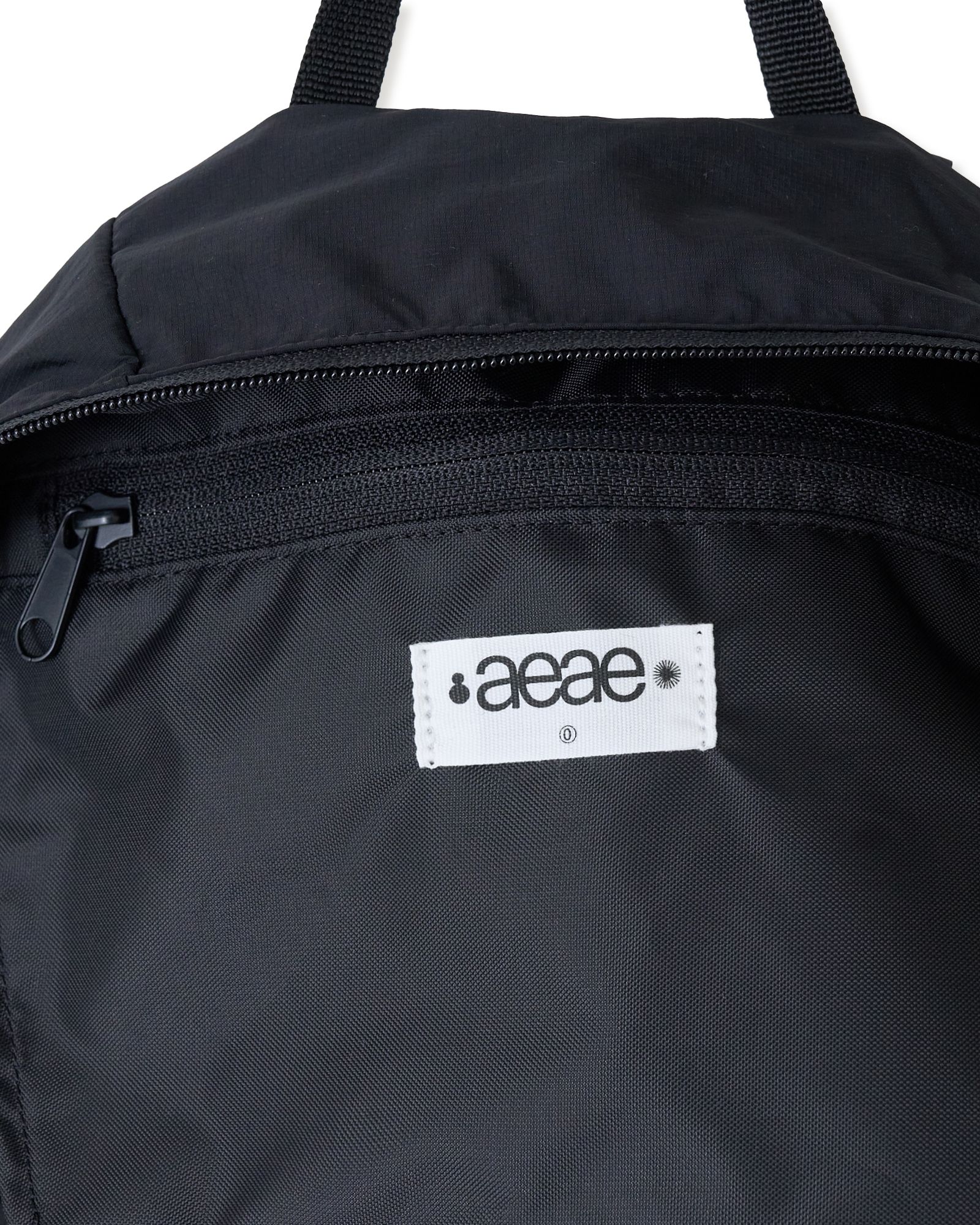 MUSINSA公式 | AEAE NEW SYMBOL BACKPACK [BLACK]