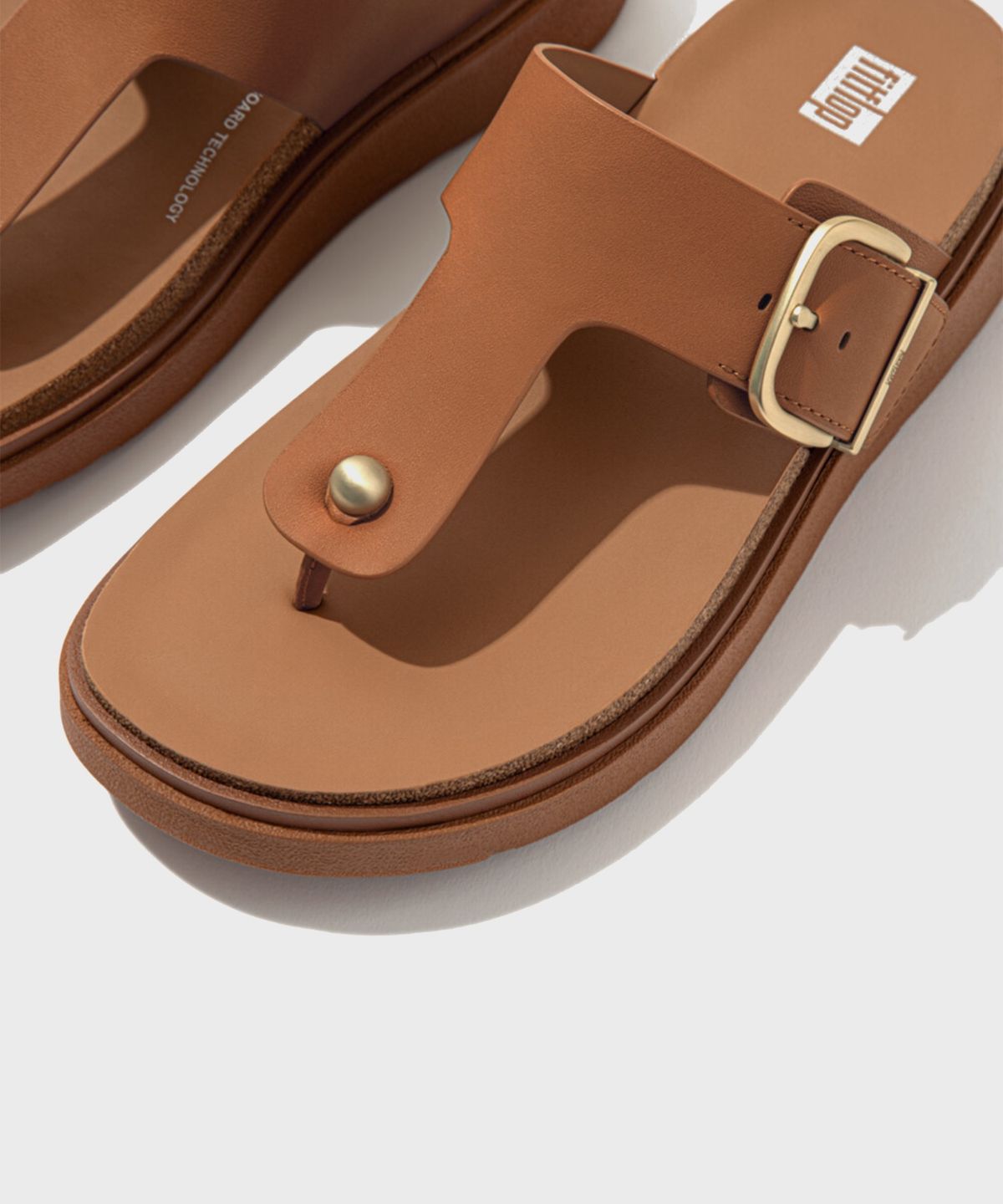 핏플랍(FITFLOP) 젠-FF 버클 토포스트 레더 쪼리 Light Tan
