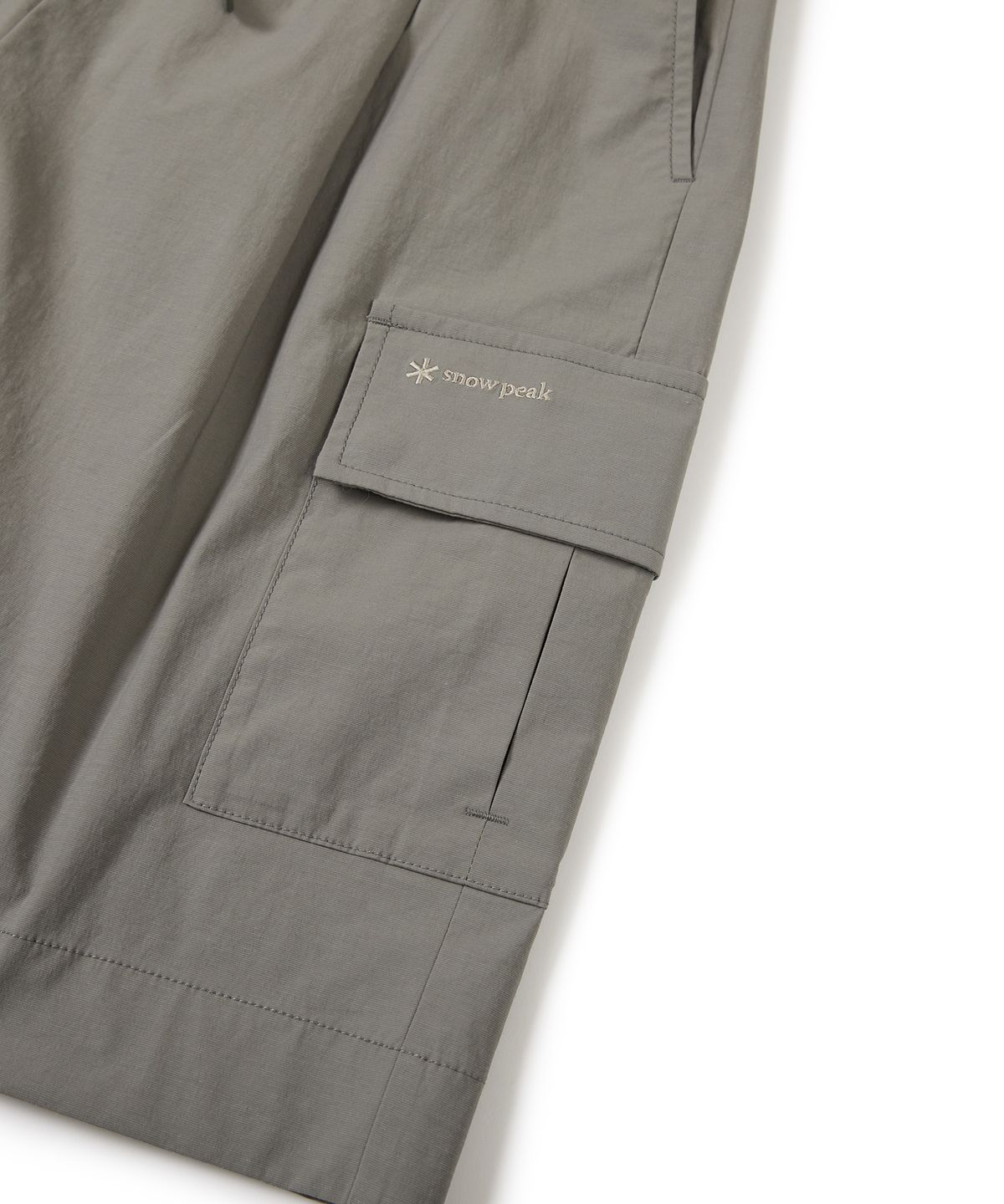 스노우피크 어패럴(SNOWPEAK APPAREL) 클랜드 여성 우븐 카고 반바지 Light Khaki (S24MWDHP11)