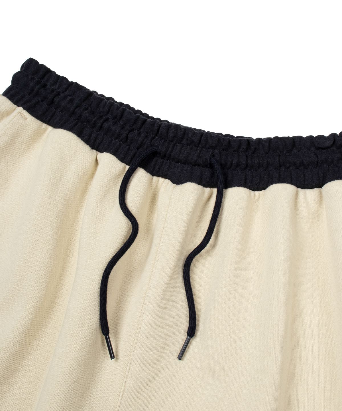 팔렛(FALLETT) 컬러 블록 스웻 쇼츠 베이지