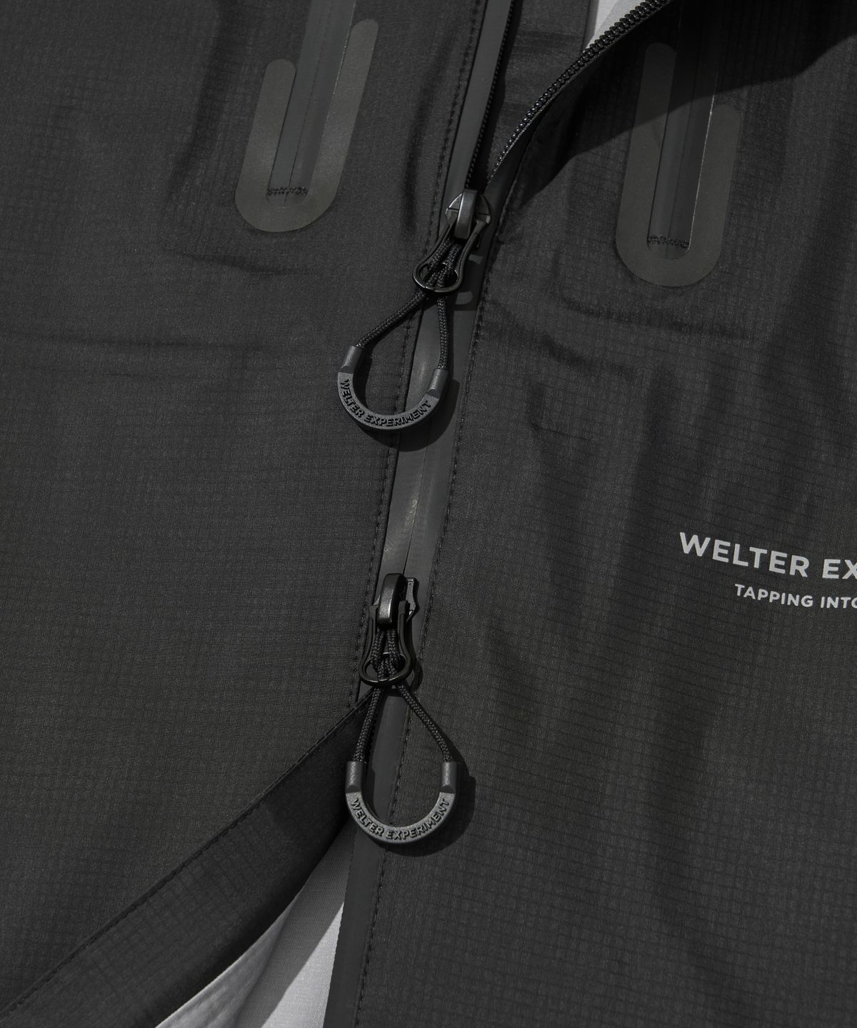 웰터 익스페리먼트(WELTER EXPERIMENT) 3LAYER REFLECTIVE STITCH JACKET_BLACK_WOL055