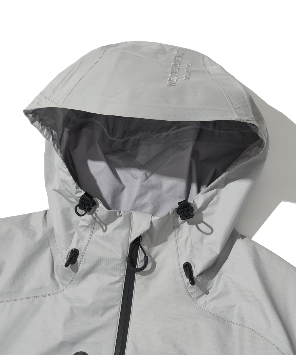 웰터 익스페리먼트(WELTER EXPERIMENT) 3LAYER REFLECTIVE STITCH JACKET_LIGHT GRAY_WOL056