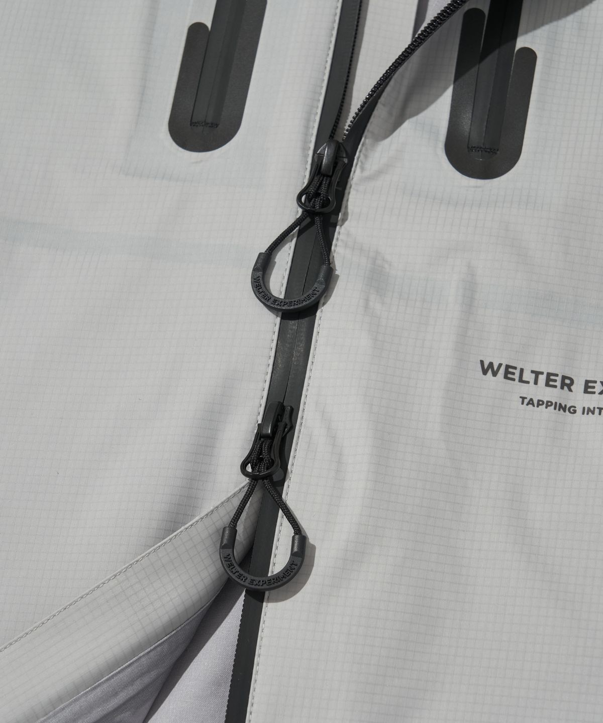 웰터 익스페리먼트(WELTER EXPERIMENT) 3LAYER REFLECTIVE STITCH JACKET_LIGHT GRAY_WOL056