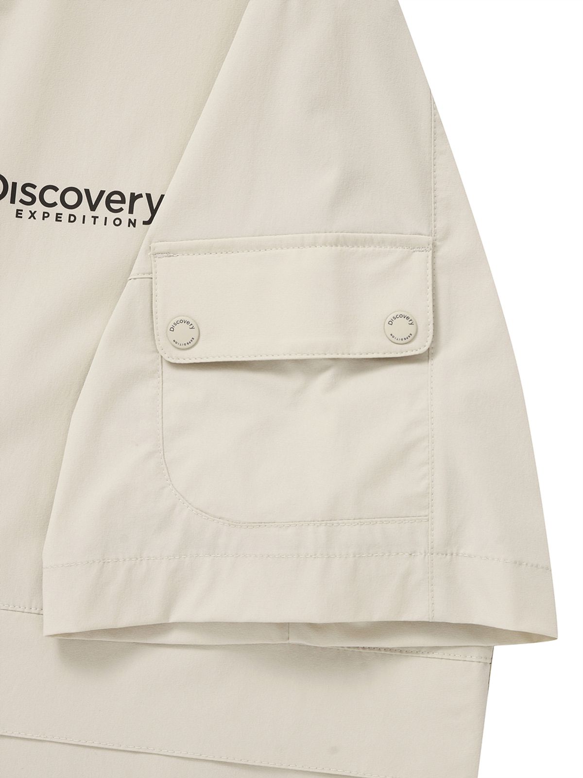 디스커버리 익스페디션(DISCOVERY EXPEDITION) 우븐 폴튼 반팔 후디드 아노락 (D.Skin Beige)