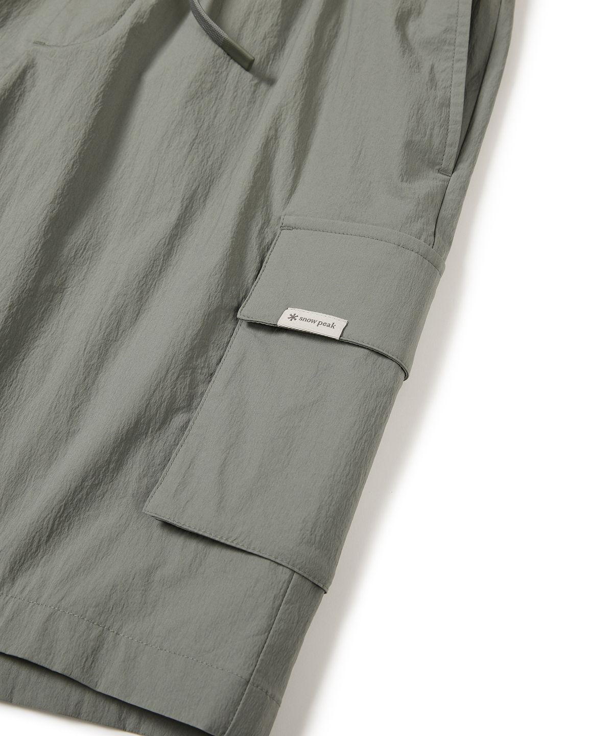 스노우피크 어패럴(SNOWPEAK APPAREL) 루트 카고 반바지 Light Khaki (S24MMRHP60)