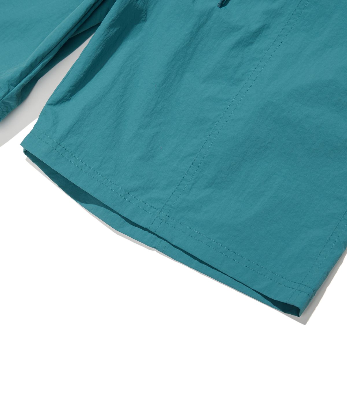 브라운브레스(BROWNBREATH) TAG NYLON SHORTS - BLUE GREEN