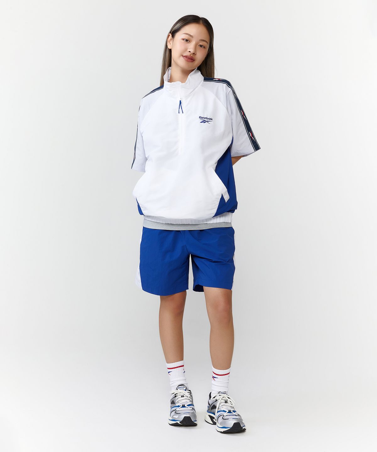 리복(REEBOK) 벡터 블록 반팔 아노락 - 오프 화이트:블루
