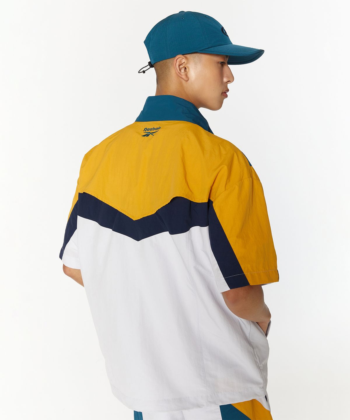 리복(REEBOK) TWIN VECTOR 반팔 아노락 - 그린