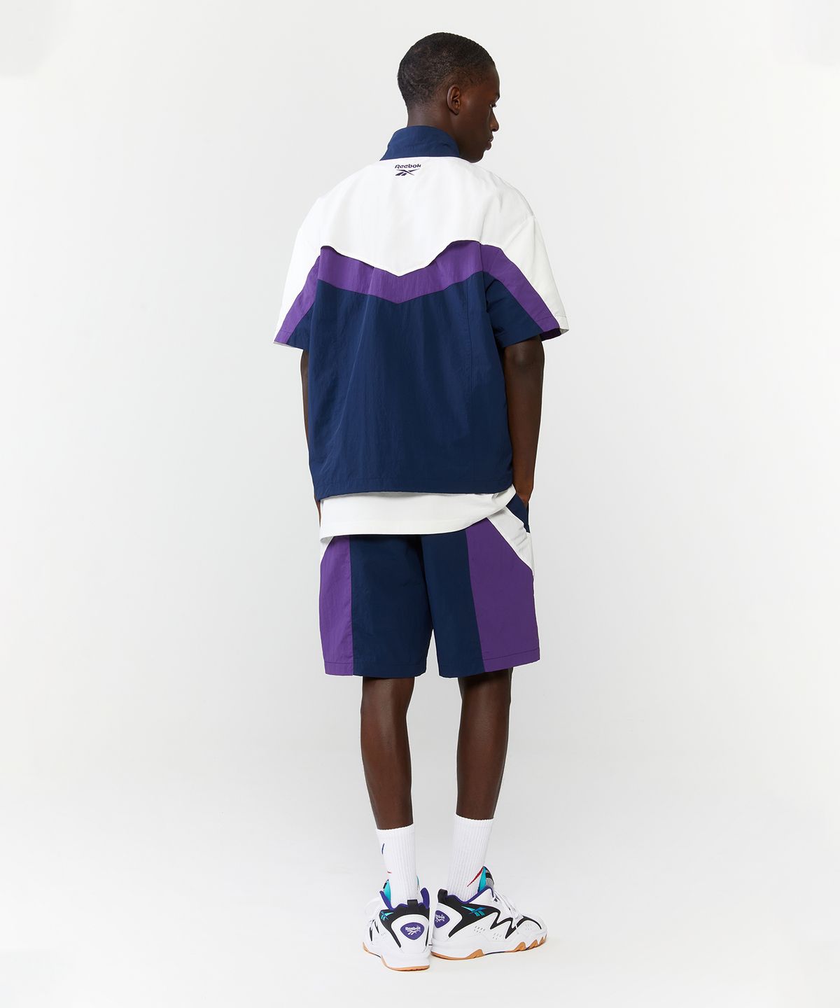 리복(REEBOK) TWIN VECTOR 반팔 아노락 - 네이비