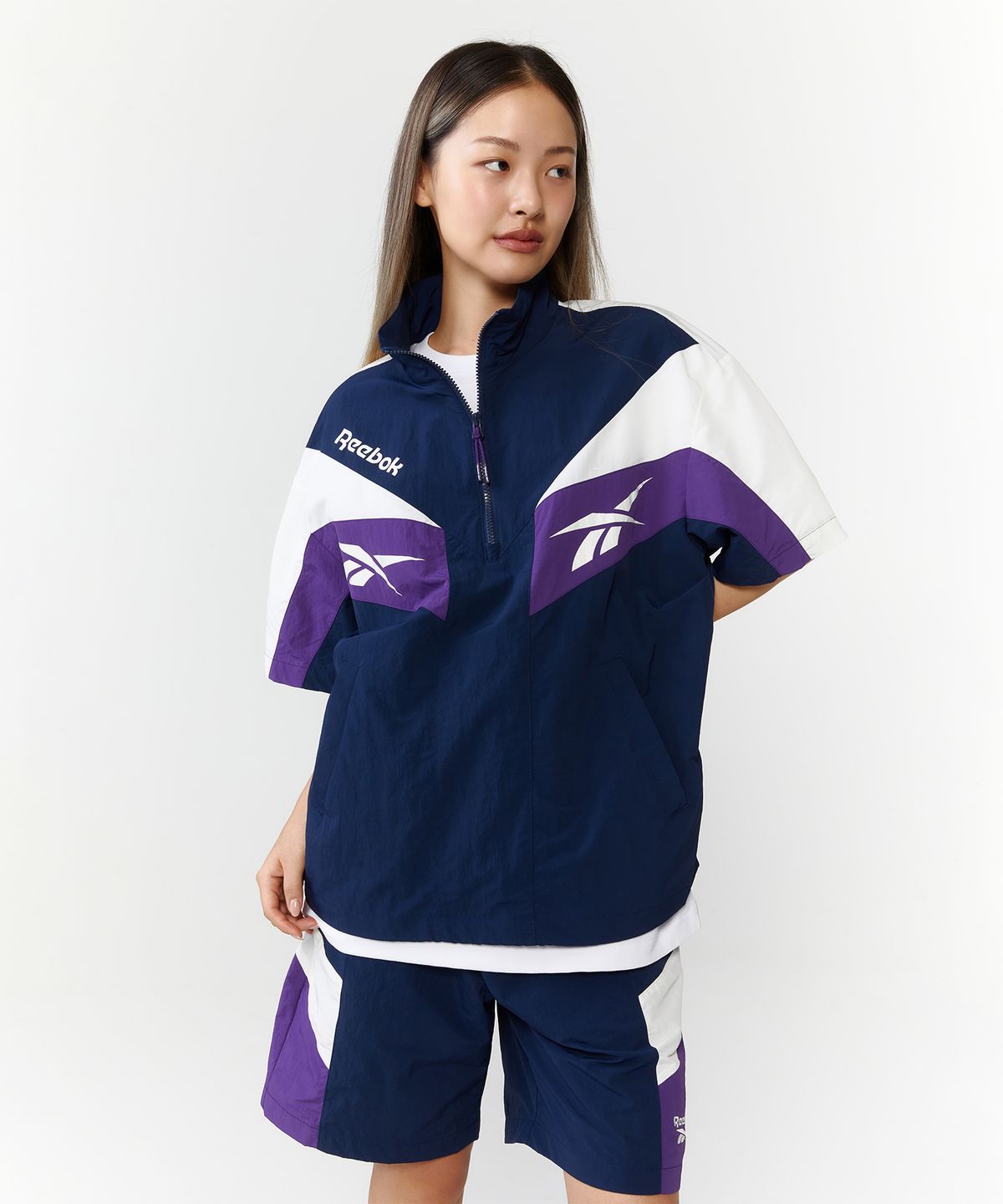 리복(REEBOK) TWIN VECTOR 반팔 아노락 - 네이비
