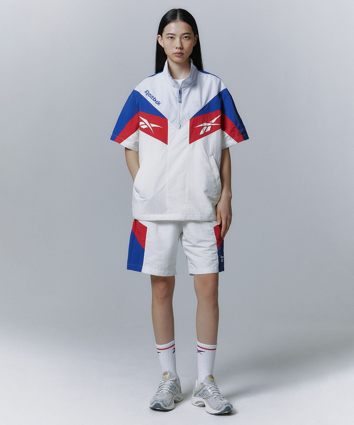 리복(REEBOK) TWIN VECTOR 반팔 아노락 - 오프 화이트