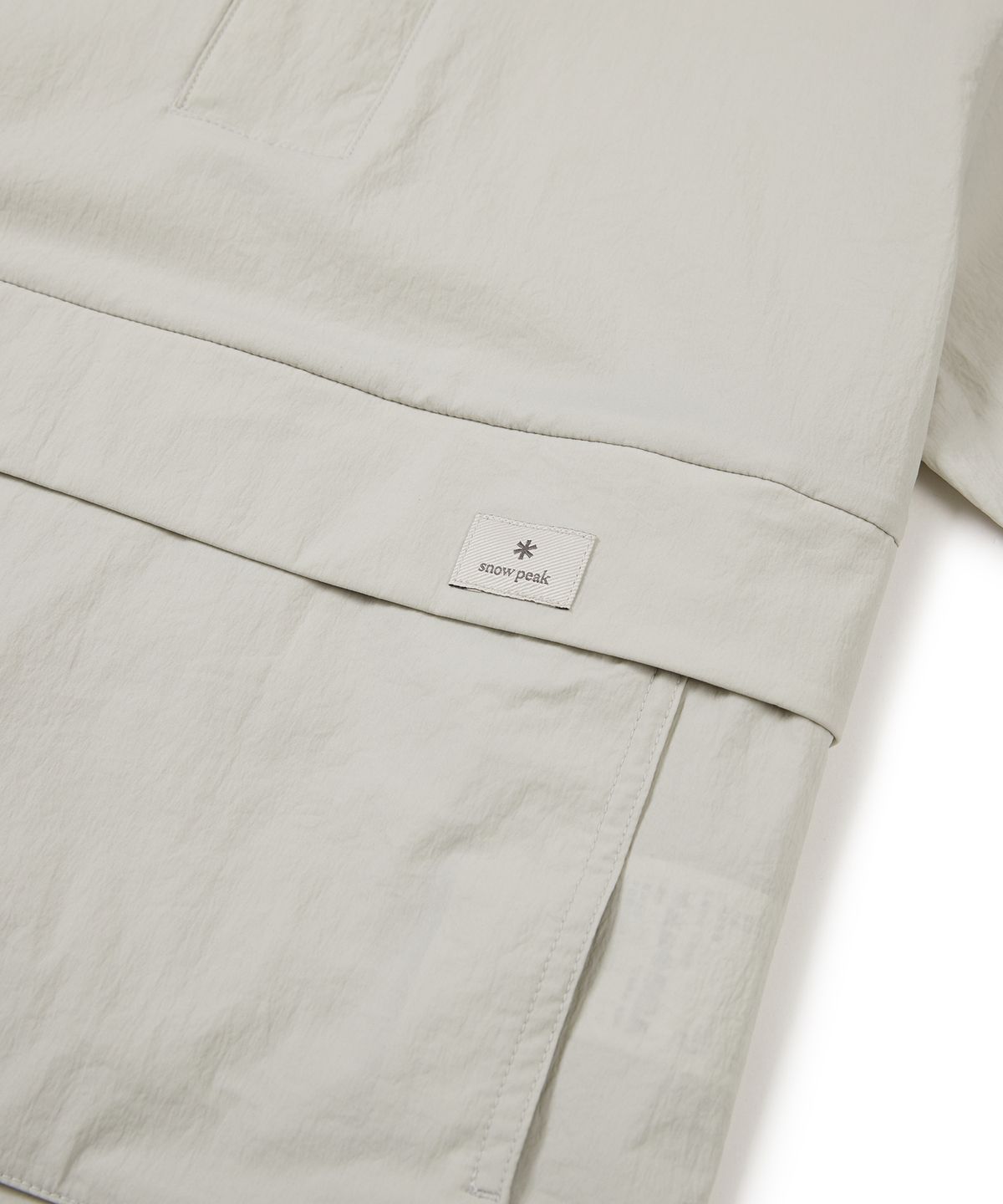스노우피크 어패럴 키즈(SNOWPEAK APPAREL KIDS) 키즈 루트 스탠드넥 반팔 아노락 Light Beige (S24MKRAN80)