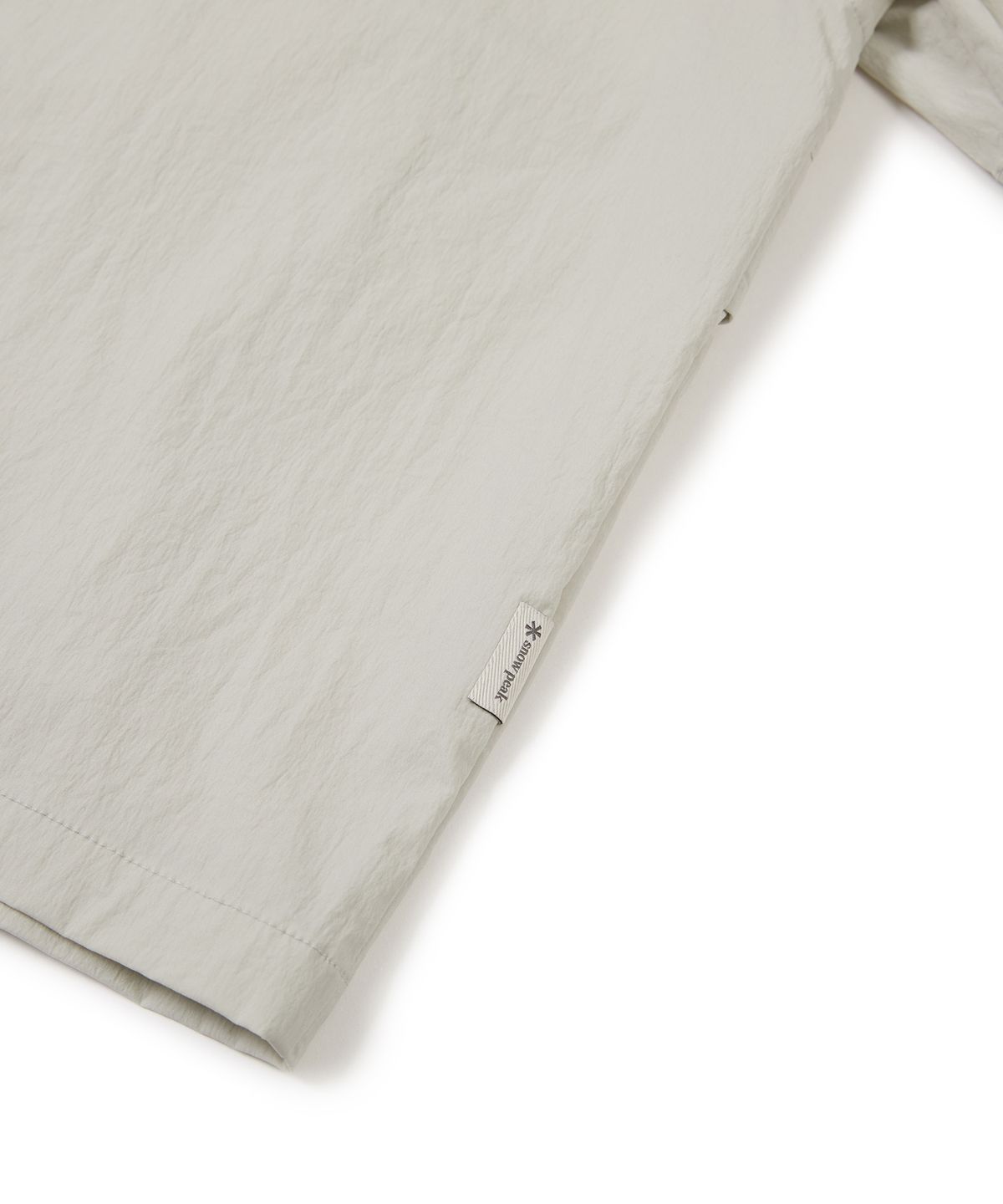 스노우피크 어패럴 키즈(SNOWPEAK APPAREL KIDS) 키즈 루트 스탠드넥 반팔 아노락 Light Beige (S24MKRAN80)