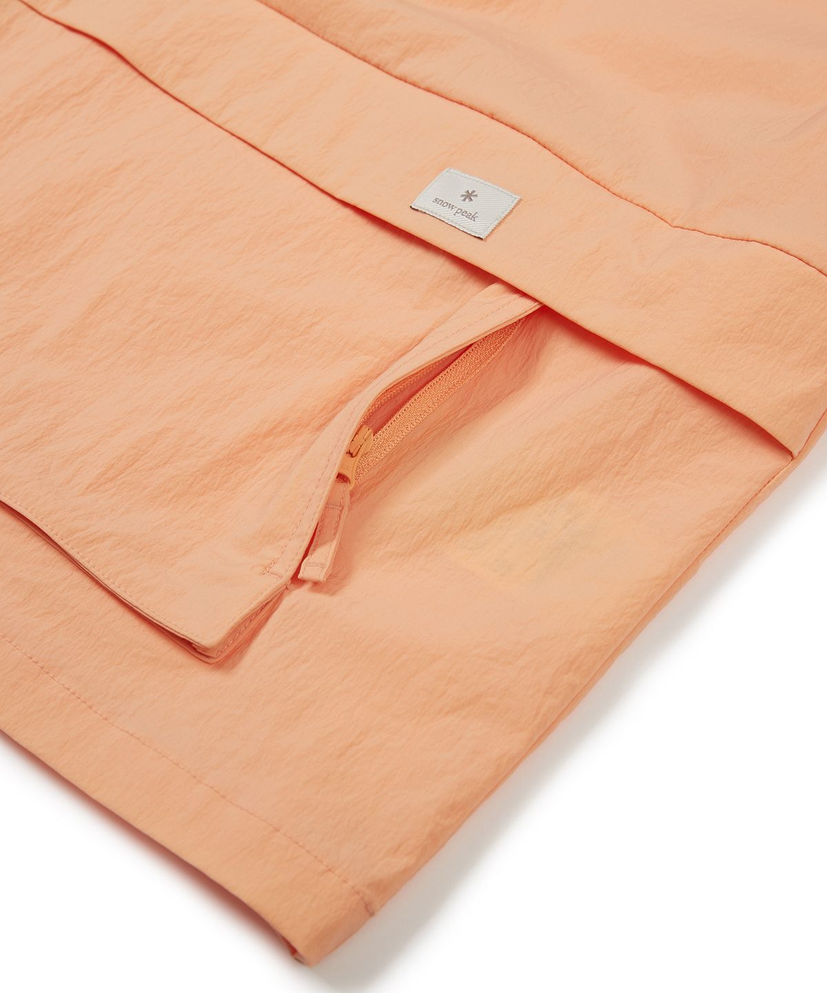 스노우피크 어패럴 키즈(SNOWPEAK APPAREL KIDS) 키즈 루트 스탠드넥 반팔 아노락 Light Orange (S24MKRAN80)