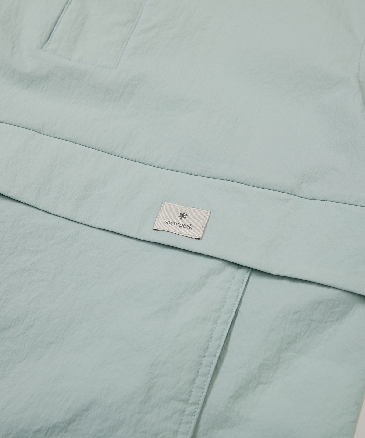 스노우피크 어패럴 키즈(SNOWPEAK APPAREL KIDS) 키즈 루트 스탠드넥 반팔 아노락 Mid Mint (S24MKRAN80)