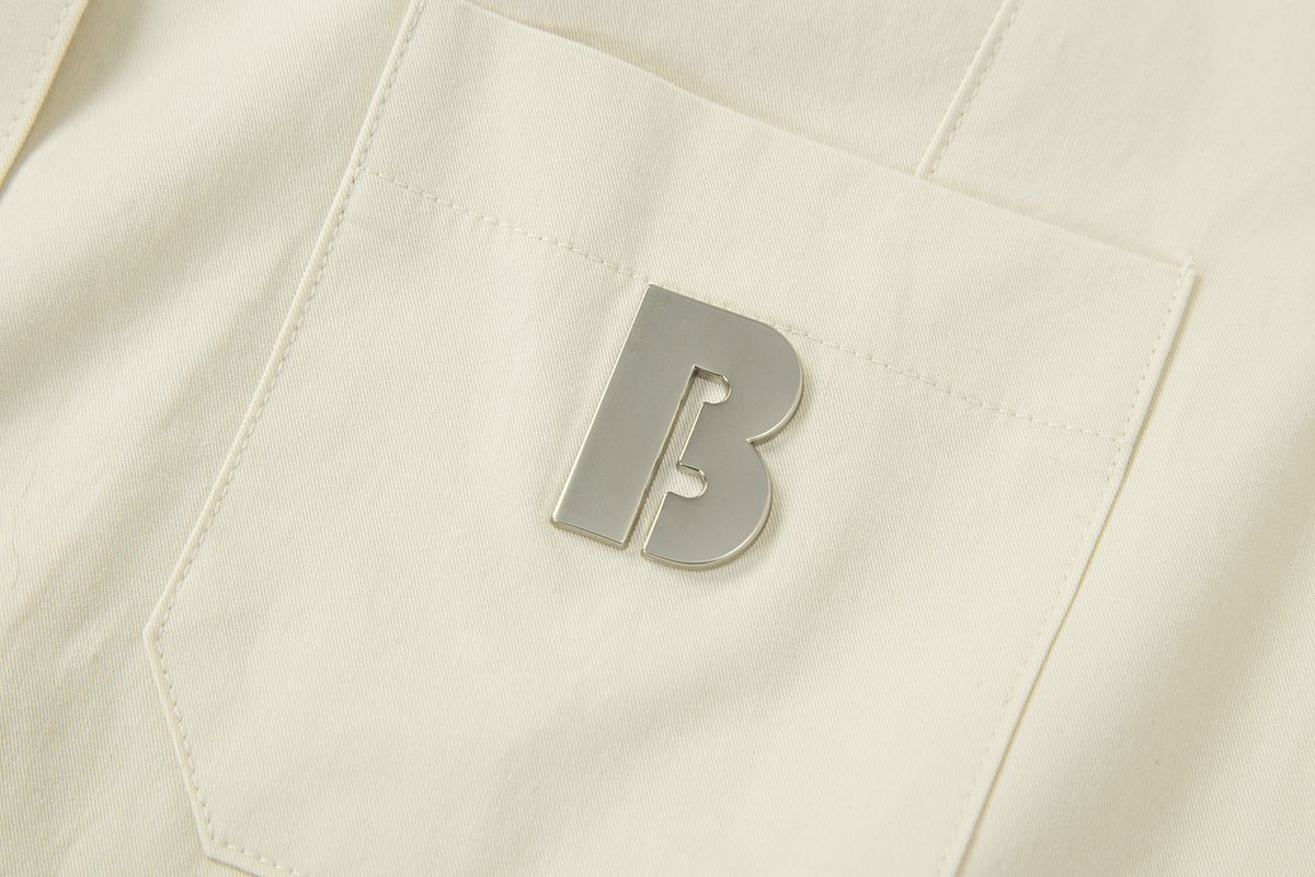 샐러드바구니(SALAD BAGUNI) Emblem Pocket Short Sleeve Shirt - butter