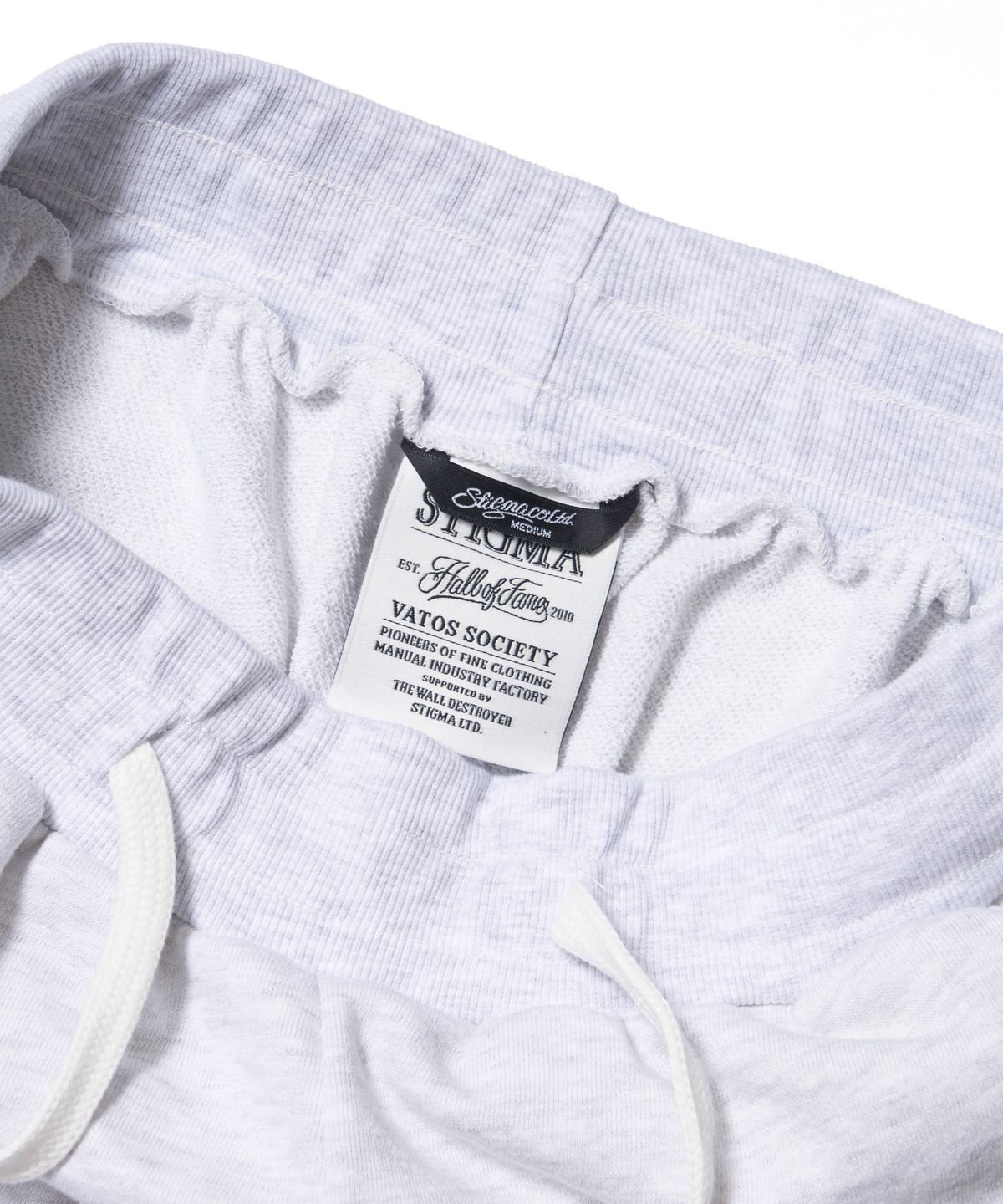 스티그마(STIGMA) STGM Logo Super Wide Jogger Pants White melange