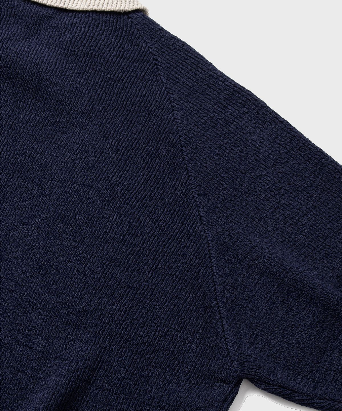넌블랭크(NONBLANK) 래글런 하프 슬리브 칼라 니트_NAVY
