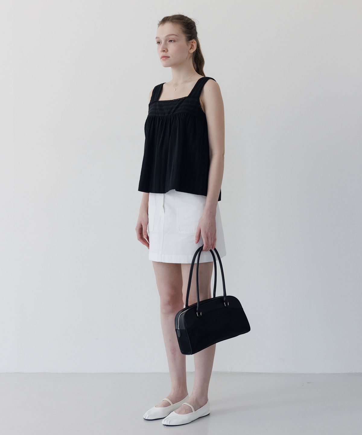 튜드먼트(TTUDEMENT) SLEEVELESS COTTON BLOUSE BLACK