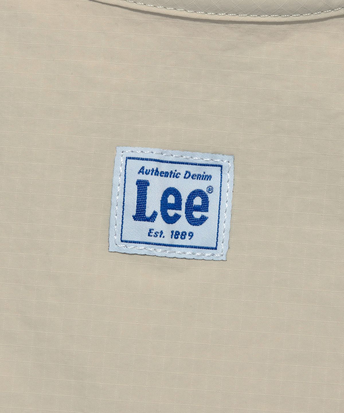 리(LEE) 트위치 로고 경량 패커블백 베이지