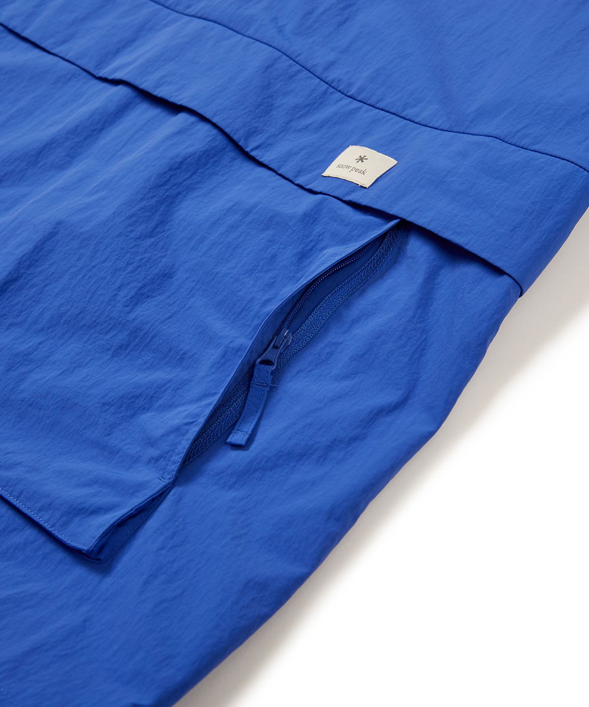 스노우피크 어패럴(SNOWPEAK APPAREL) 타슬란 우븐 비비드 반팔 아노락 Royal Blue (S24MMLAN56)