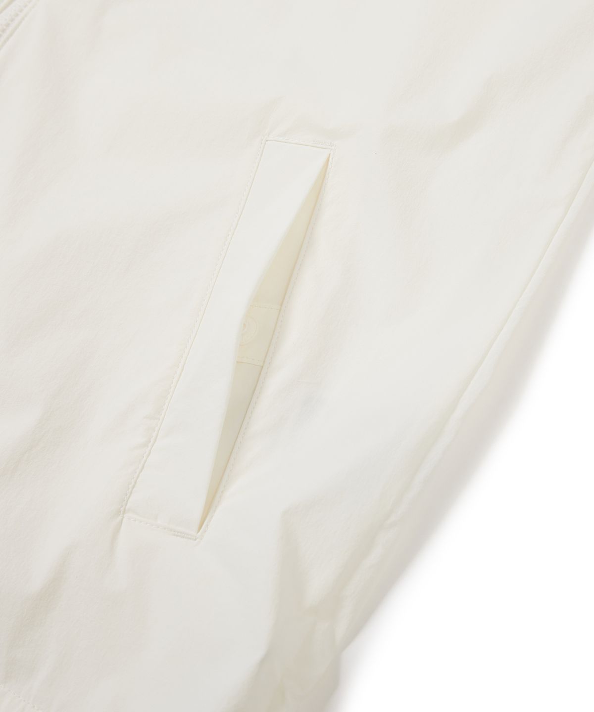 스노우피크 어패럴(SNOWPEAK APPAREL) 씬테크 우븐 스탠드넥 바람막이 Off White (S24MMSWB34)