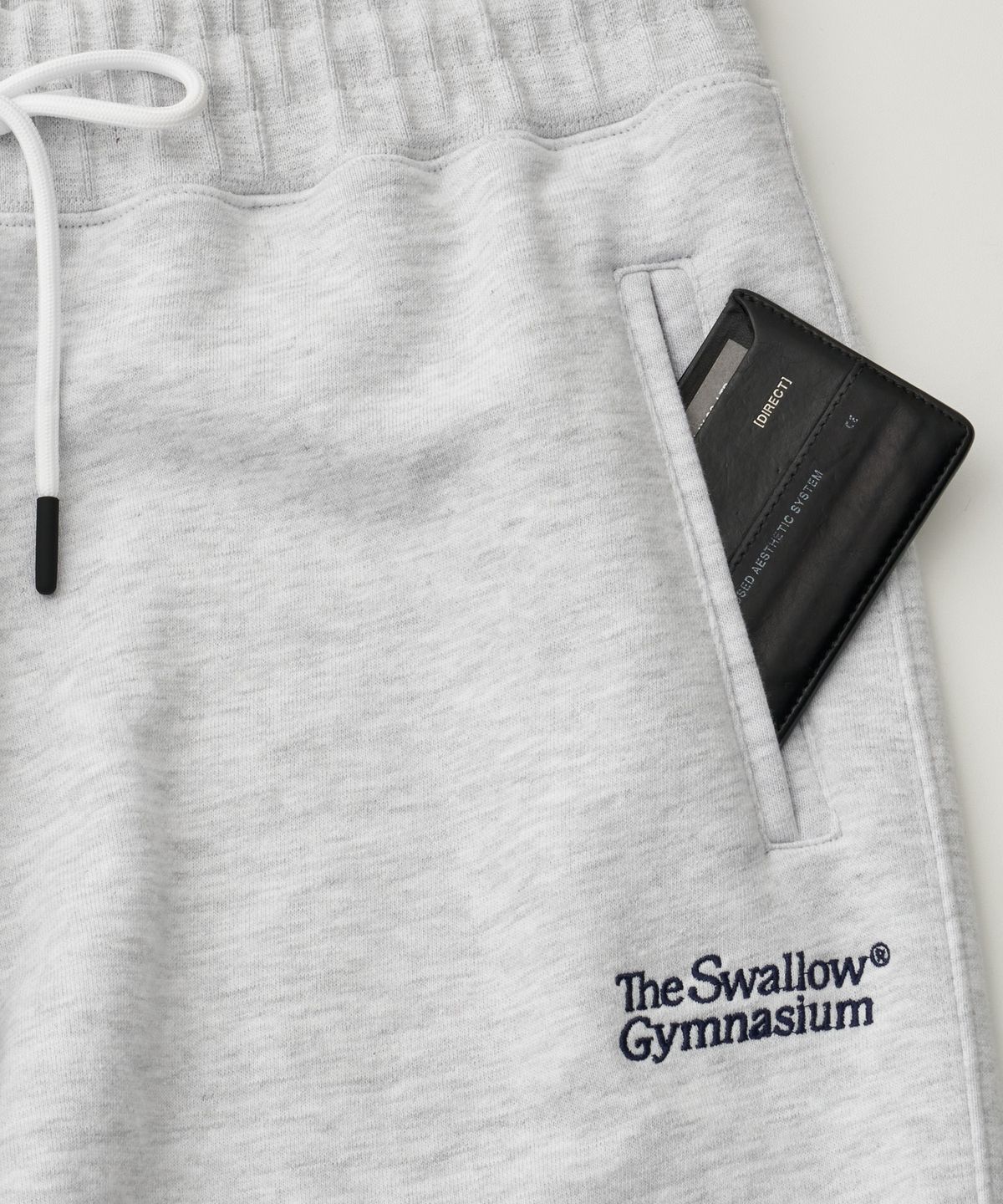 어나더 오피스(ANOTHER OFFICE) Gymnasium Sweat Pants (White - Melange)
