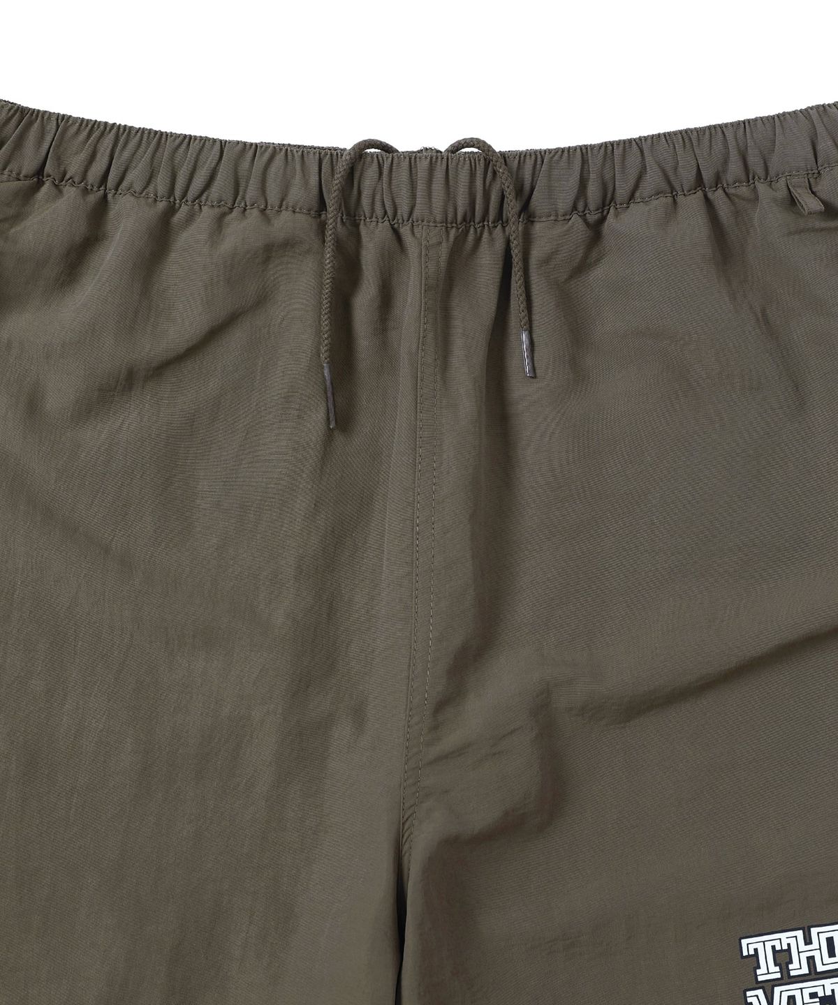 디스이즈네버댓(THISISNEVERTHAT) Big Logo Nylon Shorts Brown