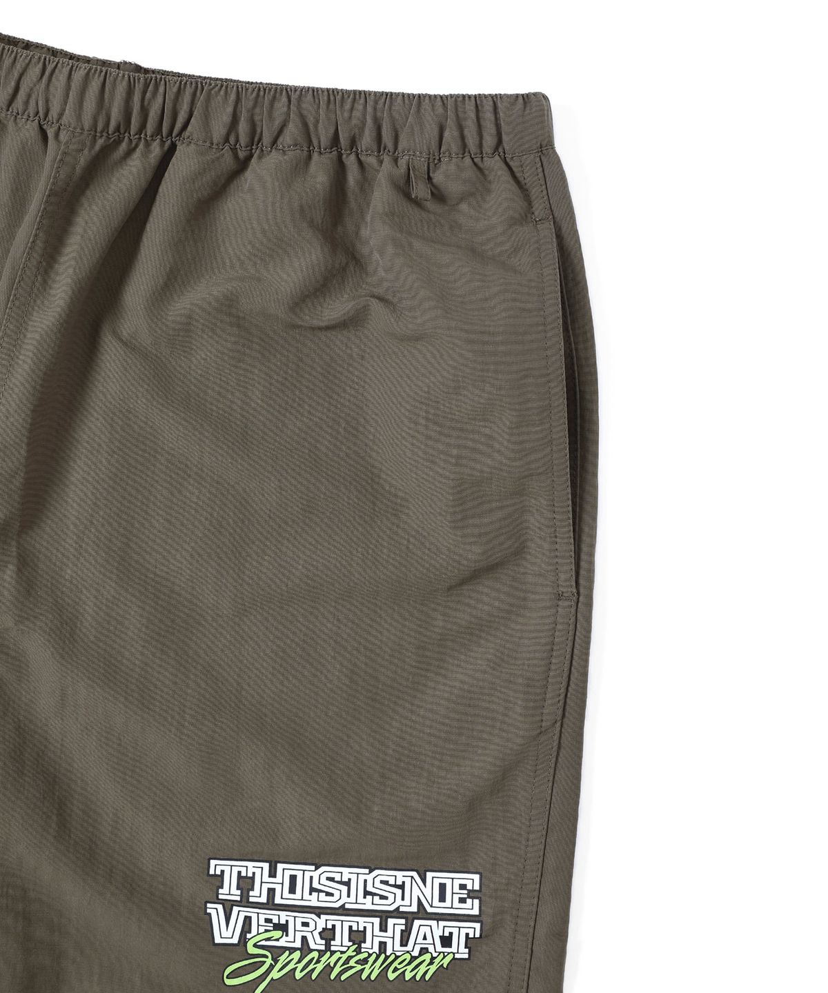 디스이즈네버댓(THISISNEVERTHAT) Big Logo Nylon Shorts Brown