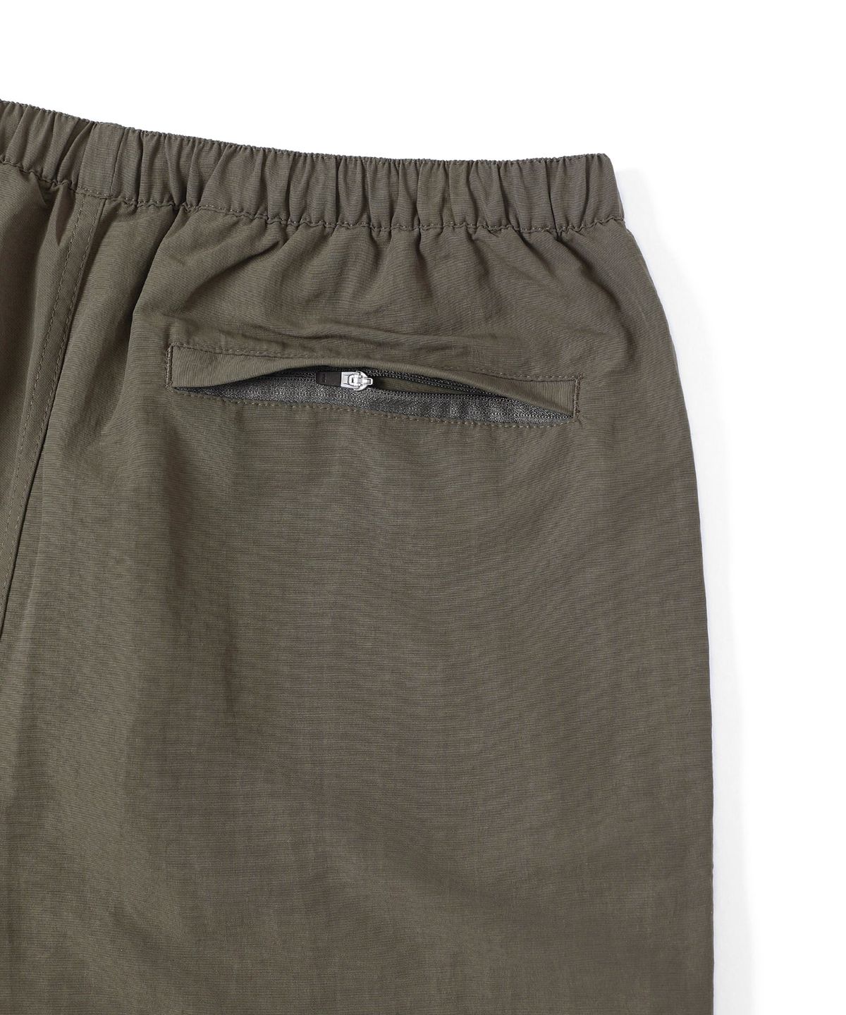 디스이즈네버댓(THISISNEVERTHAT) Big Logo Nylon Shorts Brown