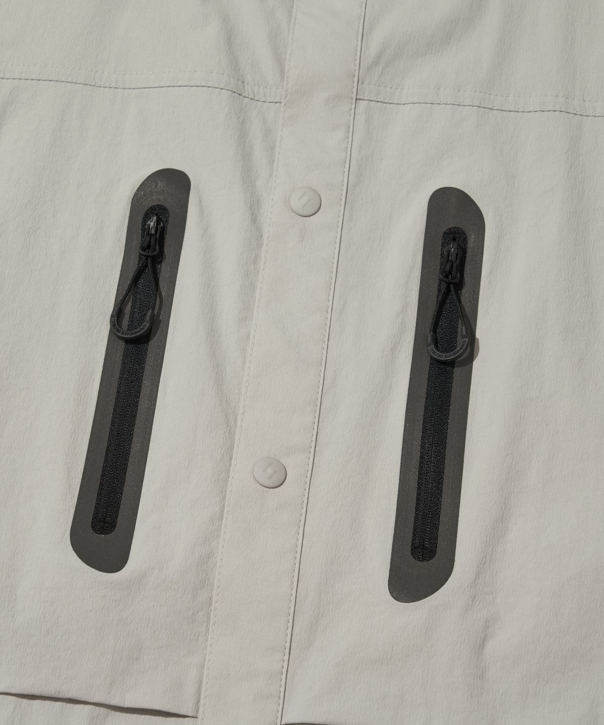 웰터 익스페리먼트(WELTER EXPERIMENT) REFLECTIVE POCKET SHIRT JACKET_LIGHT GRAY_WCL016