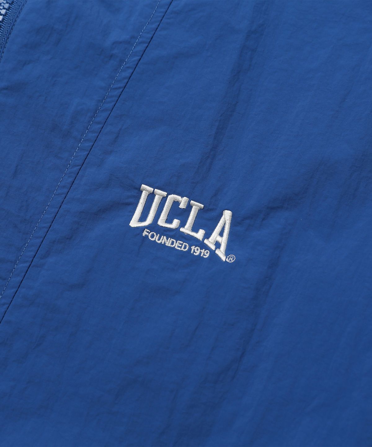 유씨엘에이(UCLA) 남여공용 경량 반팔 하이넥 아노락[BLUE](UA3UJ98_43)