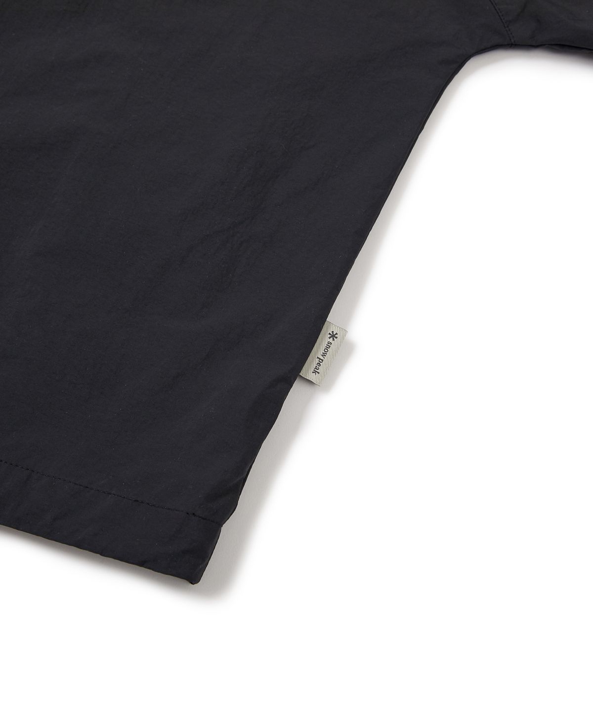 스노우피크 어패럴(SNOWPEAK APPAREL) 타슬란 여성 우븐 반팔 아노락 Black (S24MWLAN51)